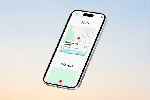 telefon z włączoną internetową stroną ślubną na stronie lokalizacji